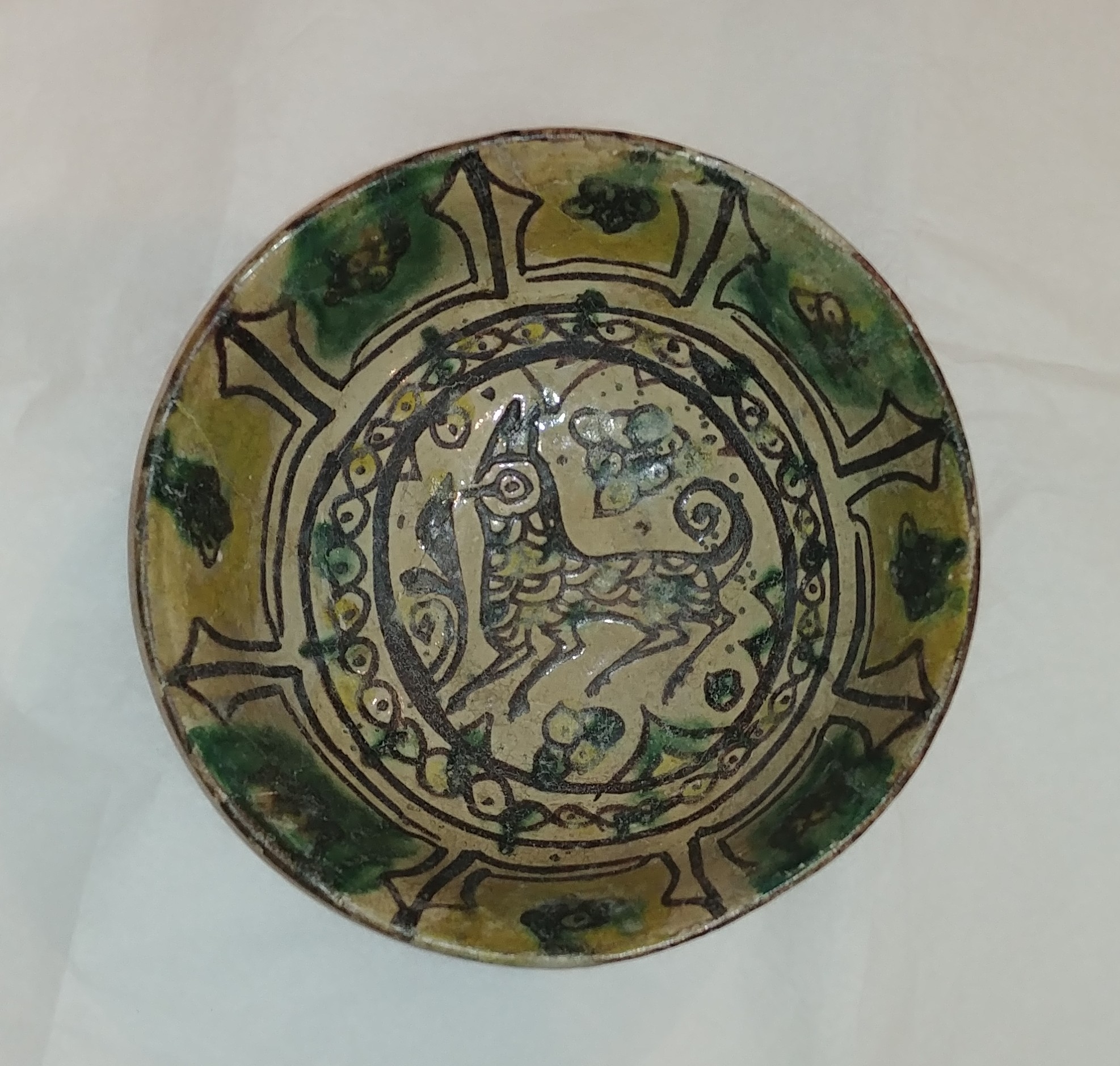 A Nishapur Bowl with Central Bird Figure, Iran 10th century AD