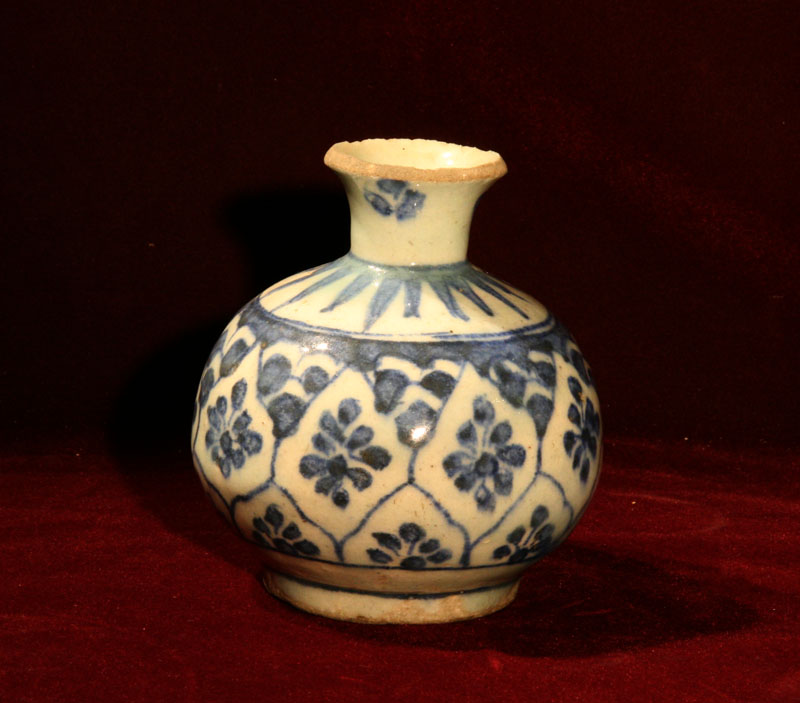 A Persian  Blue & White Pottery Vase.