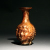 A Roman Janus Mould Blown Head Flask